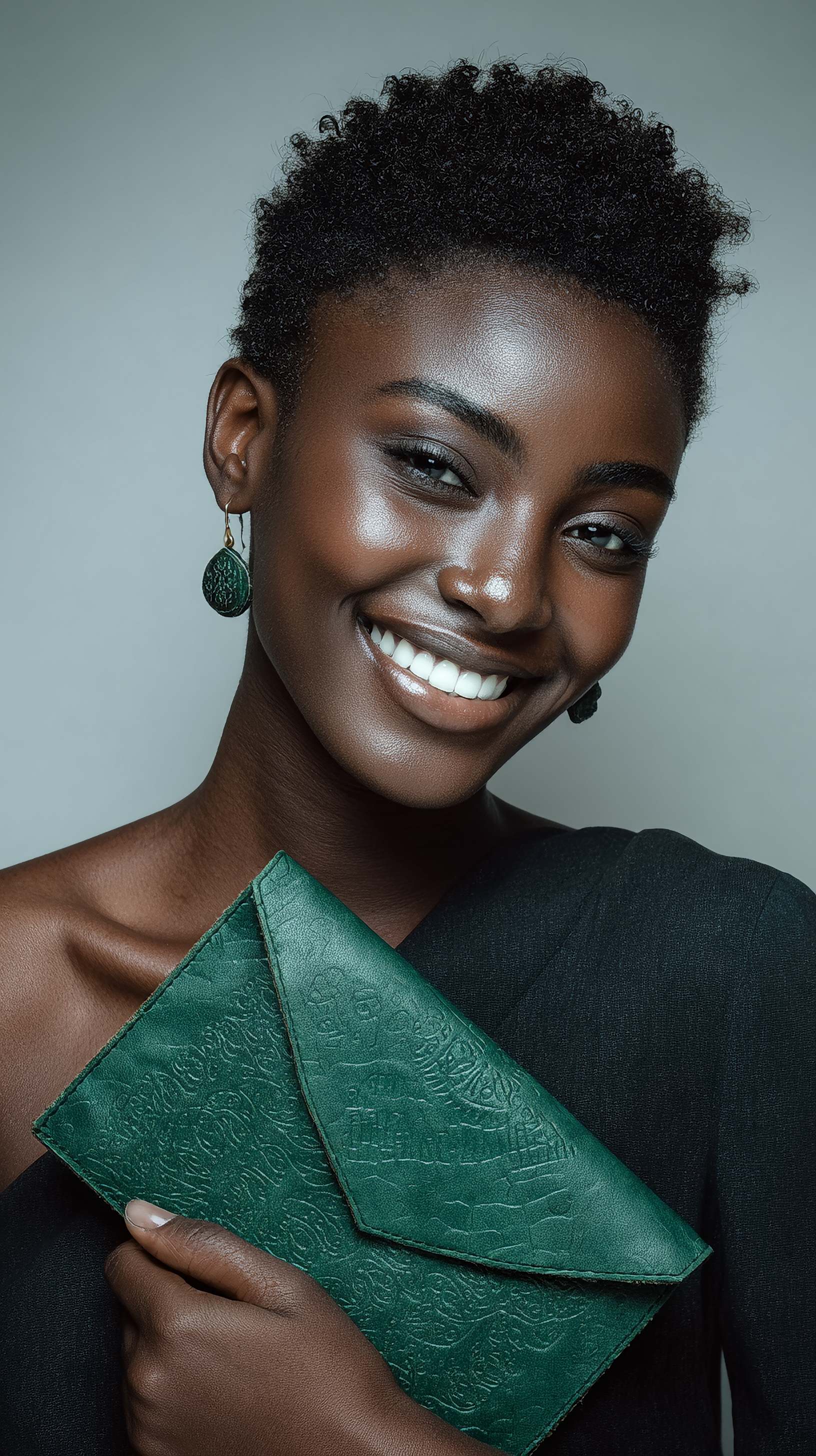 Smiling woman holding a green textured clutch